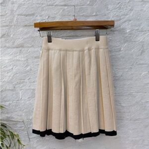 Chic Cream A-Line mini Skirt with Black Hem